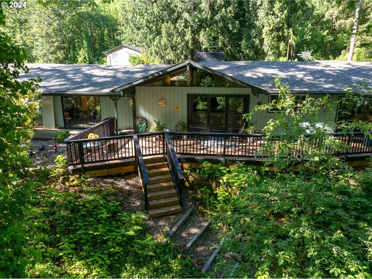 A Scappoose home surrounded by evergreen trees